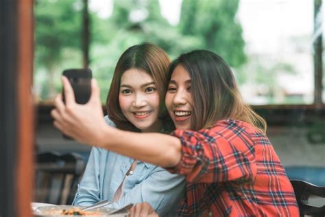 Free Photo Beautiful Happy Asian Women Lesbian Lgbt Couple Sitting