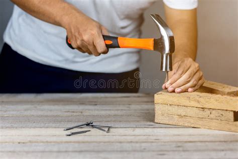 Carpenter Man Hammering A Nail Stock Photo Image Of Create Craftsman