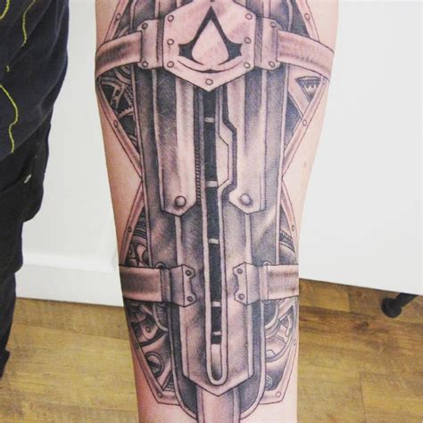 Share 68+ assassin's creed hidden blade tattoo - in.cdgdbentre