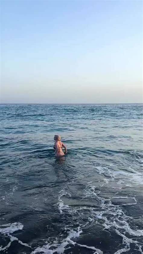 Very Beautiful And Happy Woman In Bikini At The Beach Scrolller