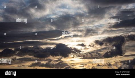 Gray sky sunset hi-res stock photography and images - Alamy