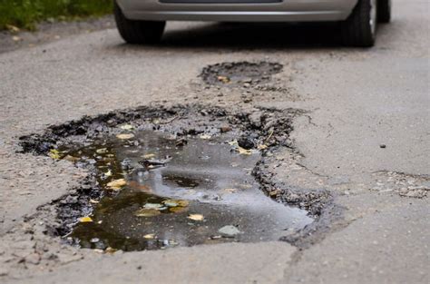 WATCH Joburg Residents Are Defacing Potholes Video