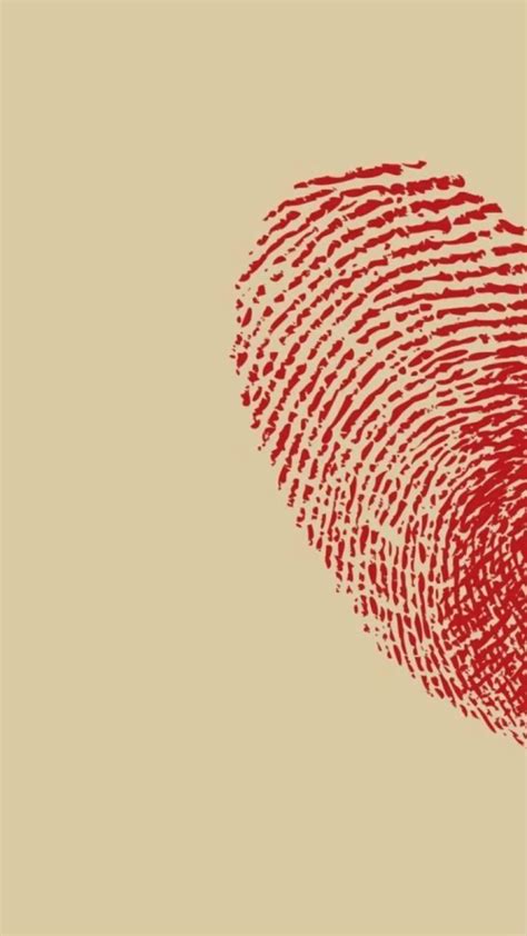 A Fingerprint In The Shape Of A Heart On A Beige Background With Red Ink