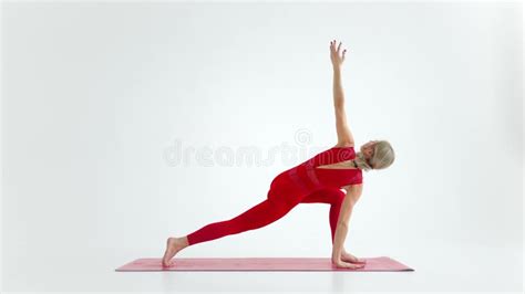 Flexible Yoga Woman Stretching Forward Bend Touching Forehead To Knees