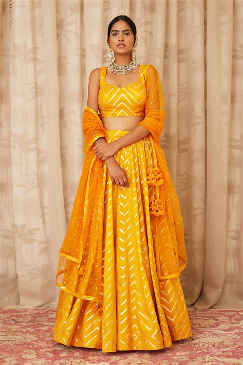 Buy Yellow Brocade Silk Leaf Neck Lehenga Set For Women By Shyam