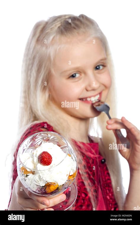 Beautiful Blonde Girl Eating Dessert On White Background Stock Photo Alamy