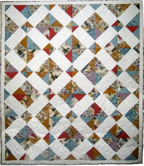 Disappearing Charm Square Quilt