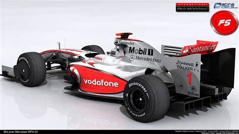 A Red And White Race Car With The Name Vodafone On It