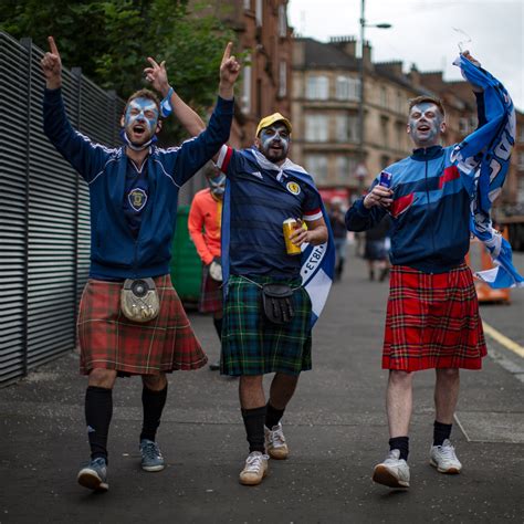 Scottish Football Fans Known As The Tartan Army Ascend On