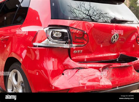 Crashed Red Volkswagen Golf Gti Car Damaged By Rear Impact Stock