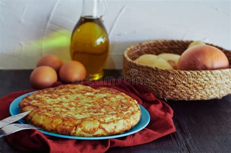 Spanish Omelette with Potato, Egg and Onion, Accompanied by Olive Oil Stock Image - Image of ...