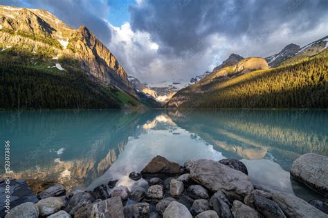 Lake Louise in Banff National Park at sunrise Stock Photo | Adobe Stock