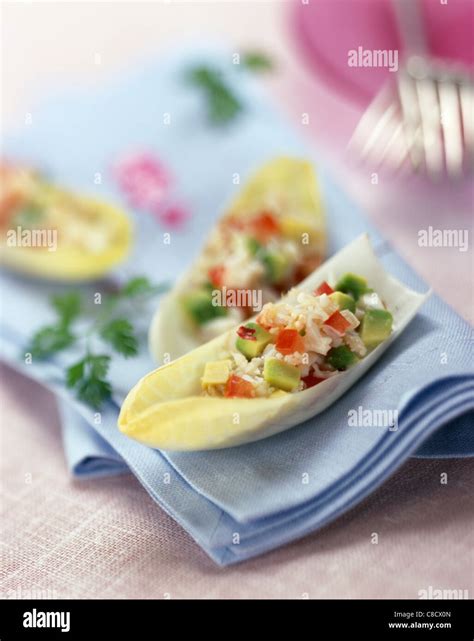 Crab salad in chicory leaves Stock Photo - Alamy