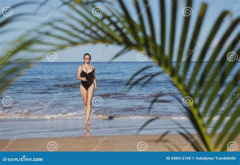 Young Happy Woman Running Barefoot on the Beach. Summer Beach and Sea ...