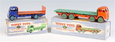 Two Dinky Toys trucks, comprising No. 902 Foden flat truck with orange ...