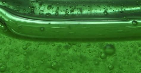 Abstract Macro Of Green Gell And Bubbles Science Stock Footage Ft