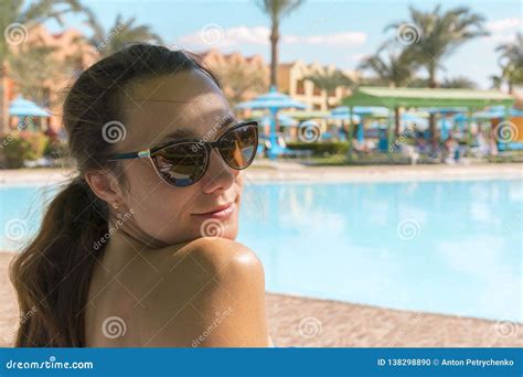 Beautiful Woman In Sunglasses By The Pool Colorful Portrait Of Young