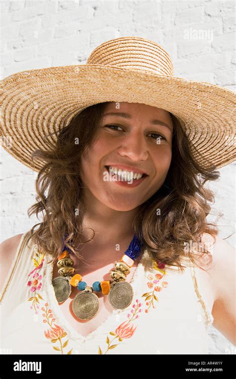 Woman Wearing A Straw Hat Stock Photo Alamy