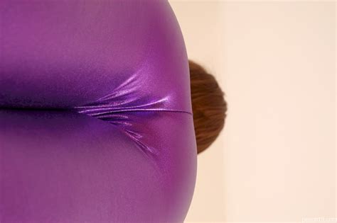 Amazing Chick Cate Harrington Showing Her Ass In Shiny Purple Pants Photos