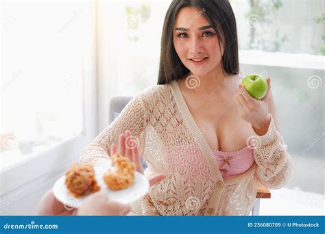 Portrait Asia Woman Wear Lingerie Or Underwear With Green Apple Holding