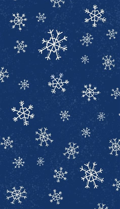 Snow Flakes On A Blue Background