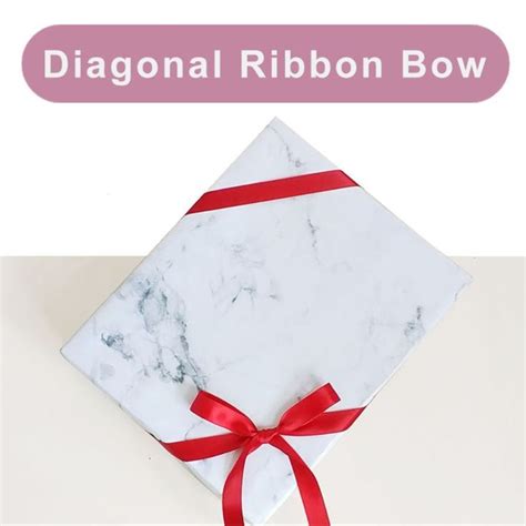 Tying A Diagonal Ribbon Bow On A Gift Box