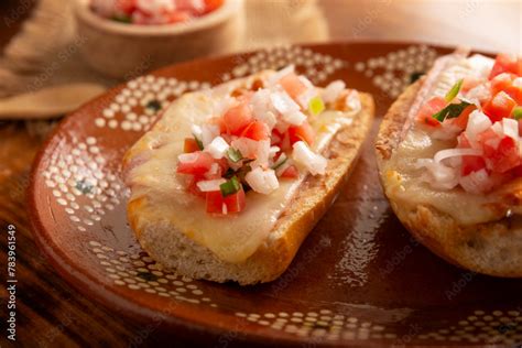 Molletes Mexican Recipe Based On Bolillo Bread Split Lengthwise