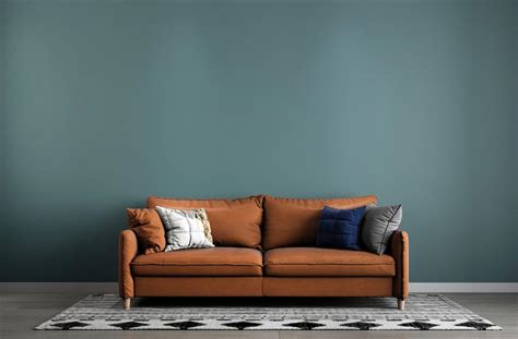 Dark Brown Sofa With Blue Pillows | Baci Living Room