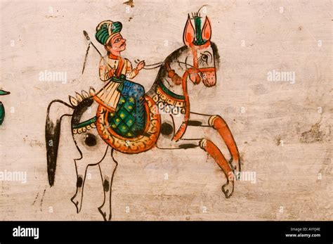 Traditional dress Indian man riding horse mural Varanasi Uttar Pradesh India Stock Photo - Alamy