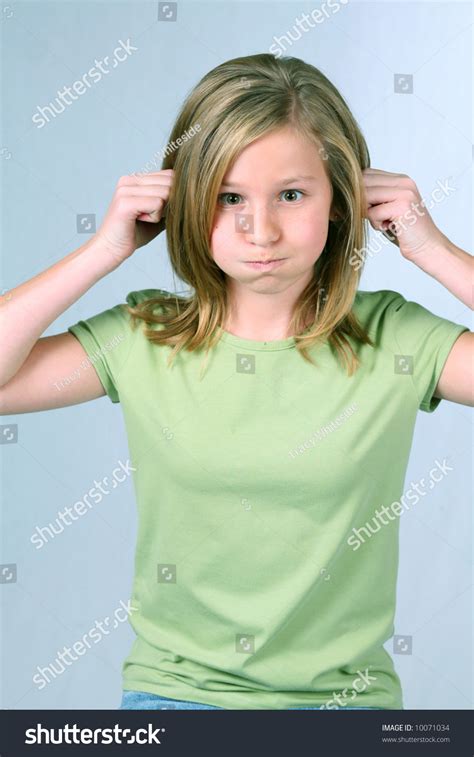 Close Up Of Pretty Blonde Preteen Making A Face Stock Photo 10071034 Shutterstock