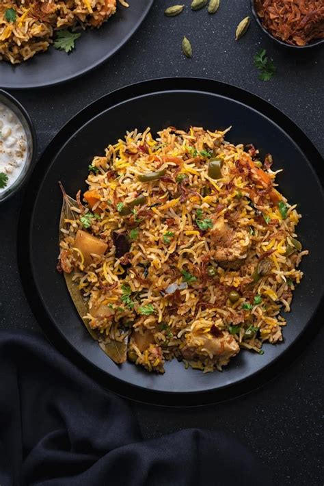 Close Up Shot Of Instant Pot Vegetable Biryani Served In Black Plate