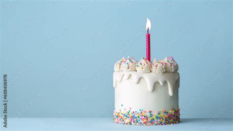 Celebration Birthday Cake With White Drip Icing And Colorful Sprinkles