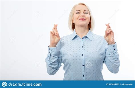 Half Length Portrait Of Beautiful Dreamy Blonde Wearing Blue Classic Blouse Standing Crossing