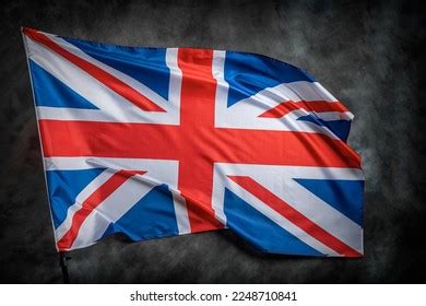 Uk Flag Waving Wind Against Dark Stock Photo 2248710841 | Shutterstock