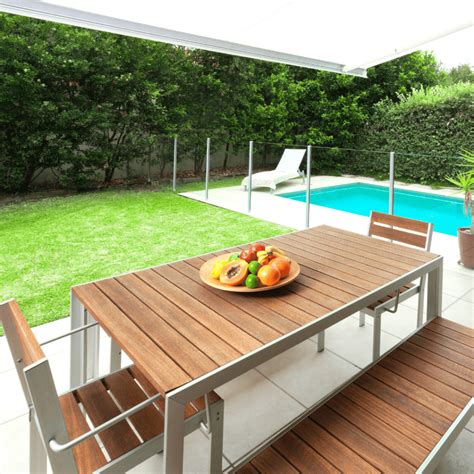 How To Protect Outdoor Wood Furniture From Sun Damage Backyards Not