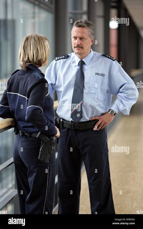 New blue police uniforms worn by 1400 male and female North Rhine ...