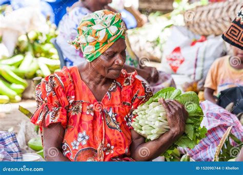 Woman Vendor At Fresh Fruit And Vegetable Market Editorial Stock Image