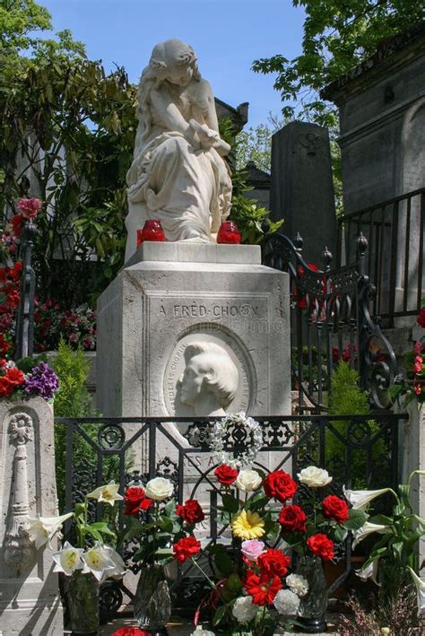 Colorful Flowers on Chopin`s Grave at Pere Lachaise Cemetery. Stock ...