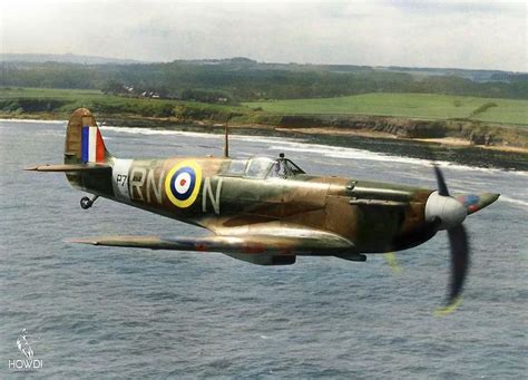 An Old Plane Flying Over The Ocean On A Cloudy Day