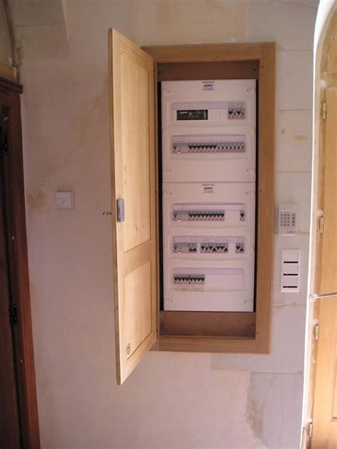 An Open Window In The Wall Shows Electrical Equipment