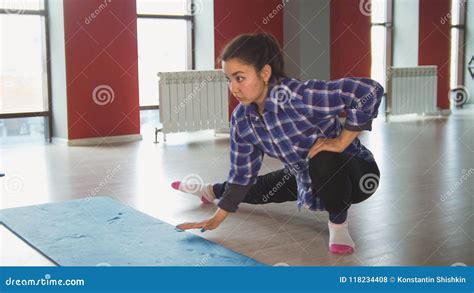 Attractive Female Brunette Stretching In Fitness Room Stock Photo Image Of Slender Legs