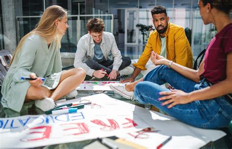 Group of university students activists making banners for protest