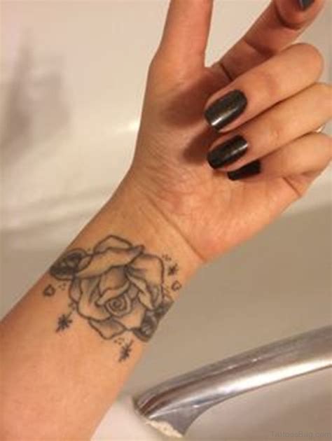 15 Delightful Black Rose Tattoos On Wrist