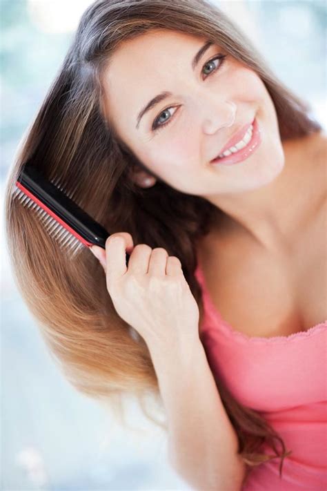 Woman Brushing Her Hair