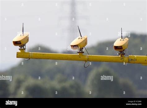 Average speed cameras on the M6 motorway in Cheshire,UK Stock Photo - Alamy