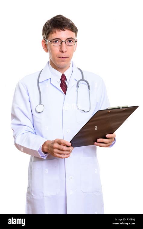 Studio Shot Of Man Doctor Holding Clipboard Stock Photo Alamy