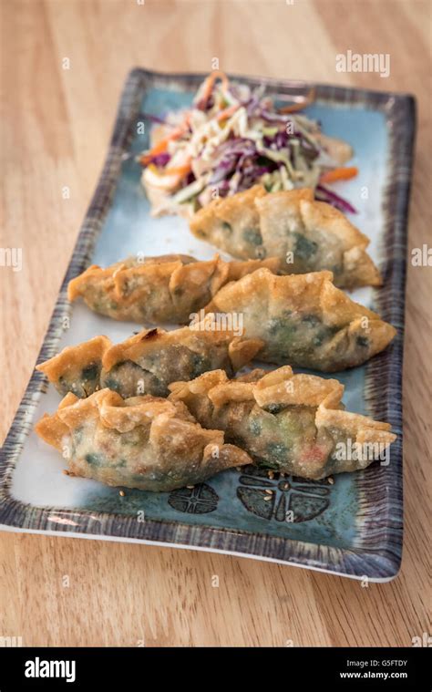 Korean Style Gyoza Vegeterian Potstickers With Soy Sauce And Pork