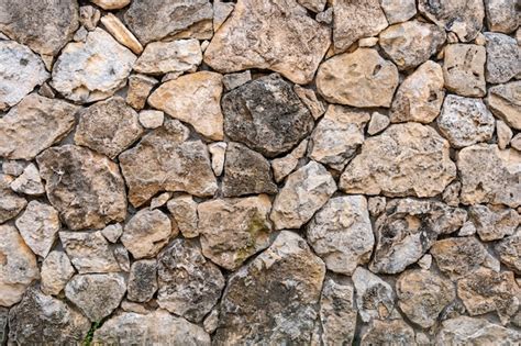 Mampostería de piedra caliza la superficie está decorada con material