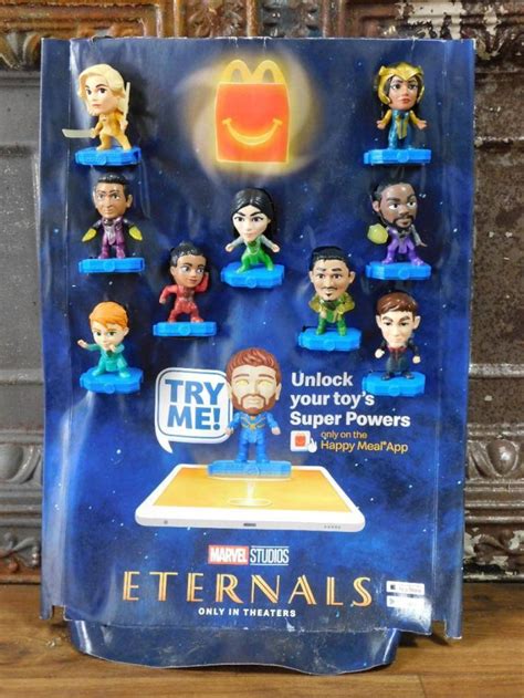 At Auction: MARVEL ETERNALS MCDONALDS HAPPY MEAL TOY DISPLAY RETRO COMIC