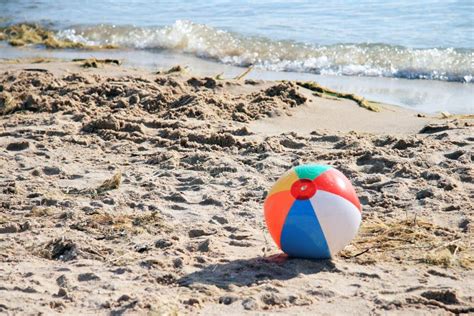 Beach Ball on Beach stock photo. Image of sand, lake - 13405074